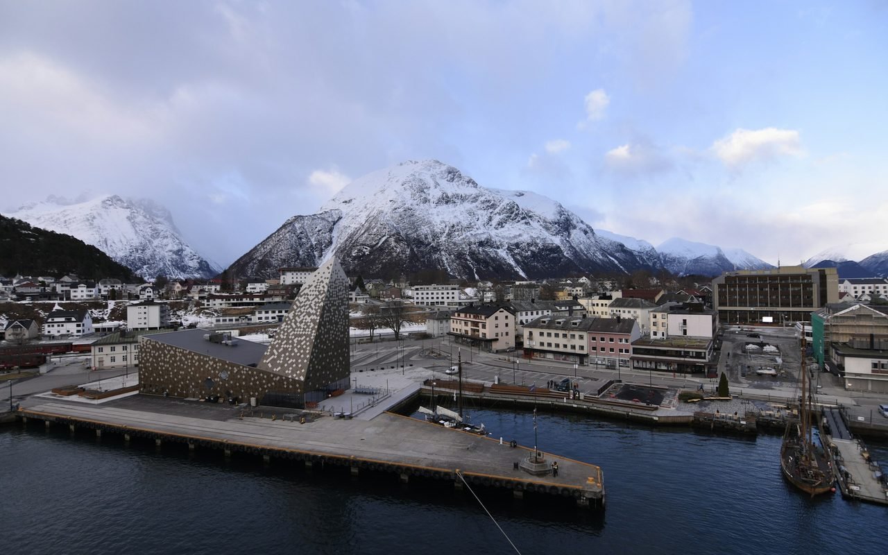 Åndalsnes harbour beneath snow-covered peaks