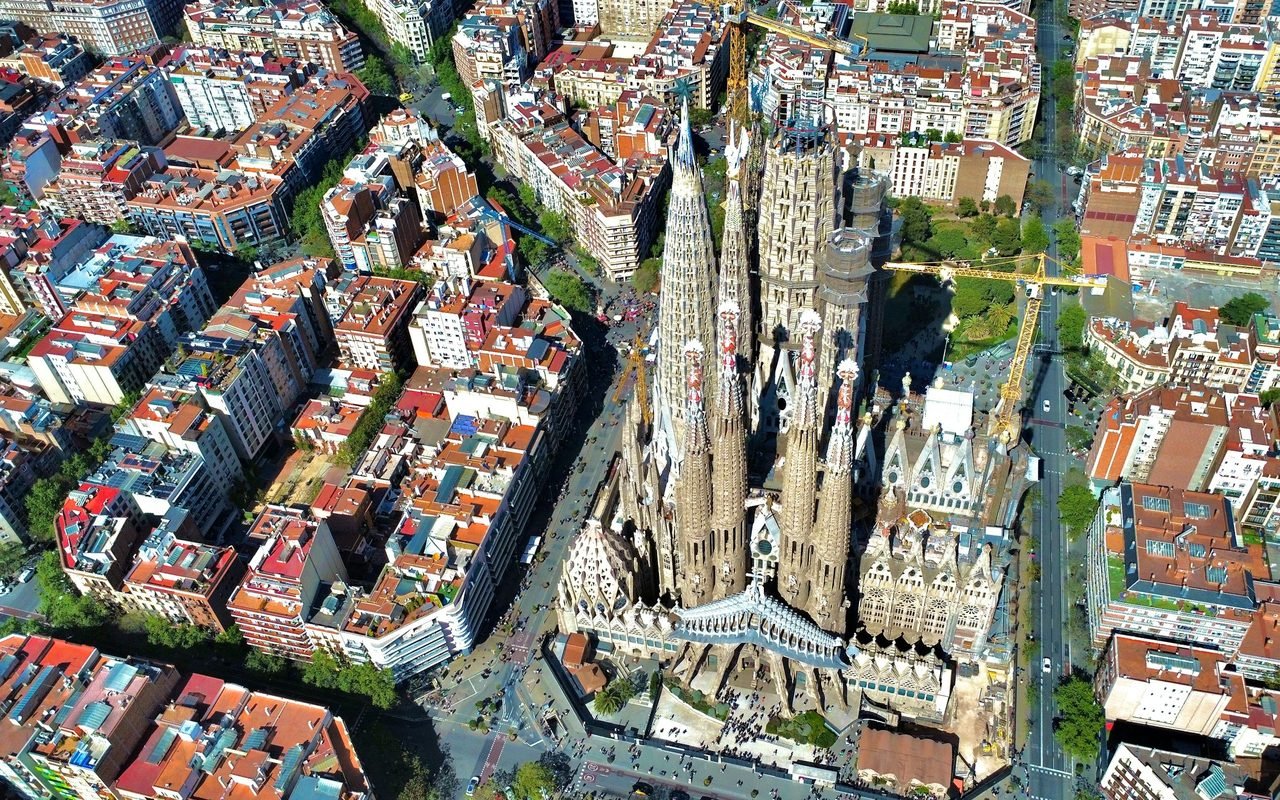 The Sagrada Família rising above Barcelona's Eixample district