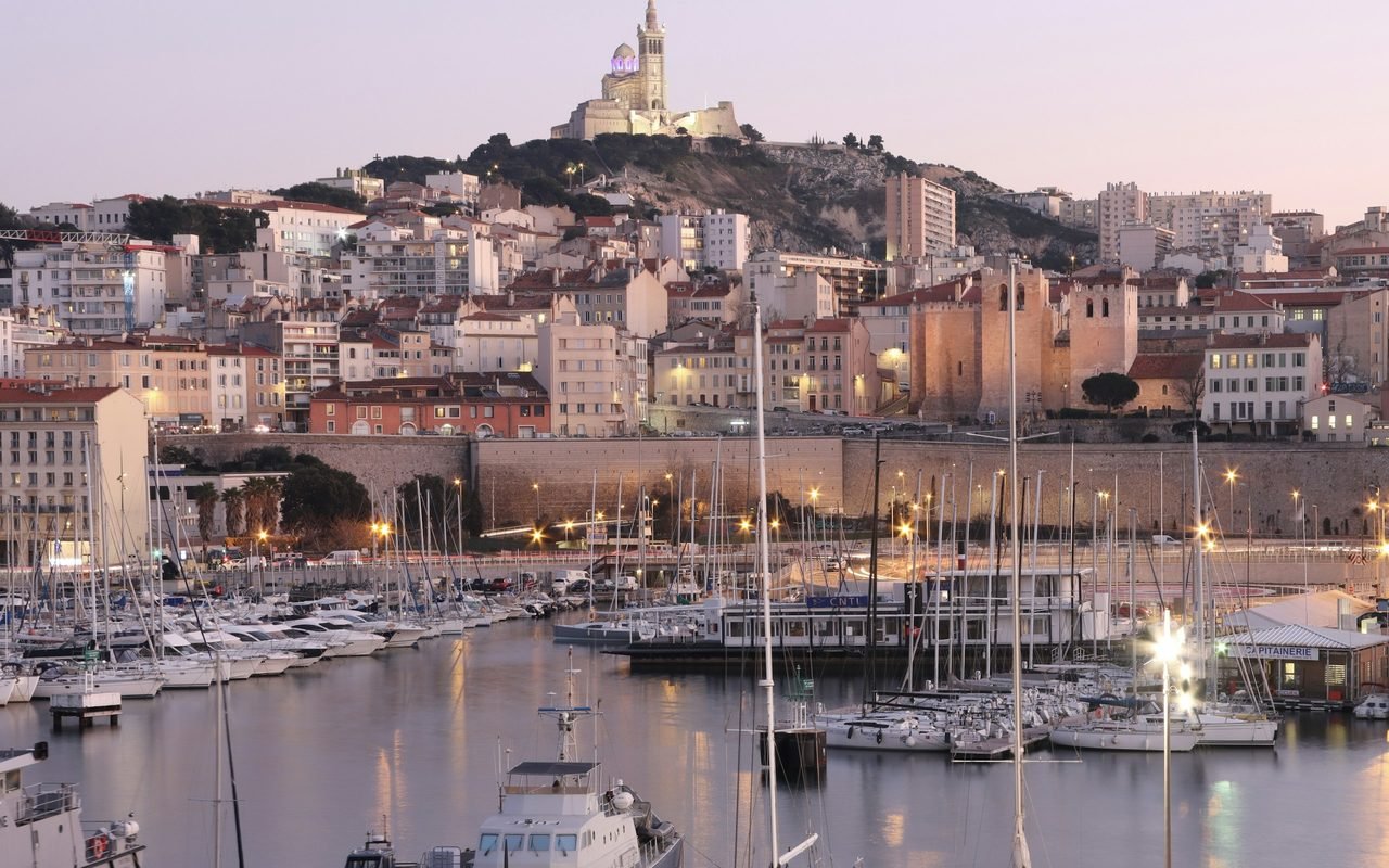 Marseille's Old Port beneath the basilica of Notre-Dame de la Garde