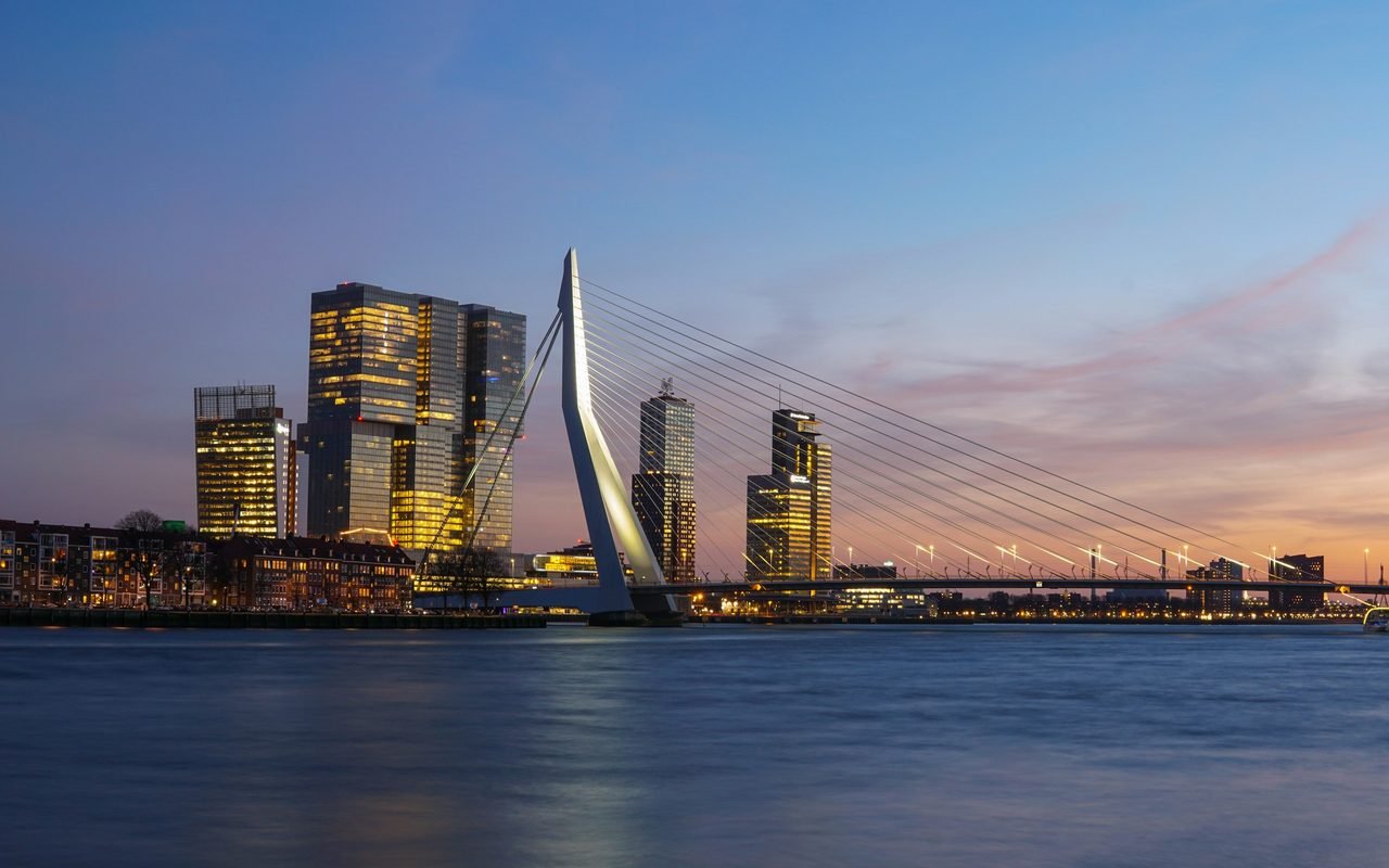 Erasmus Bridge and the Rotterdam skyline at dusk