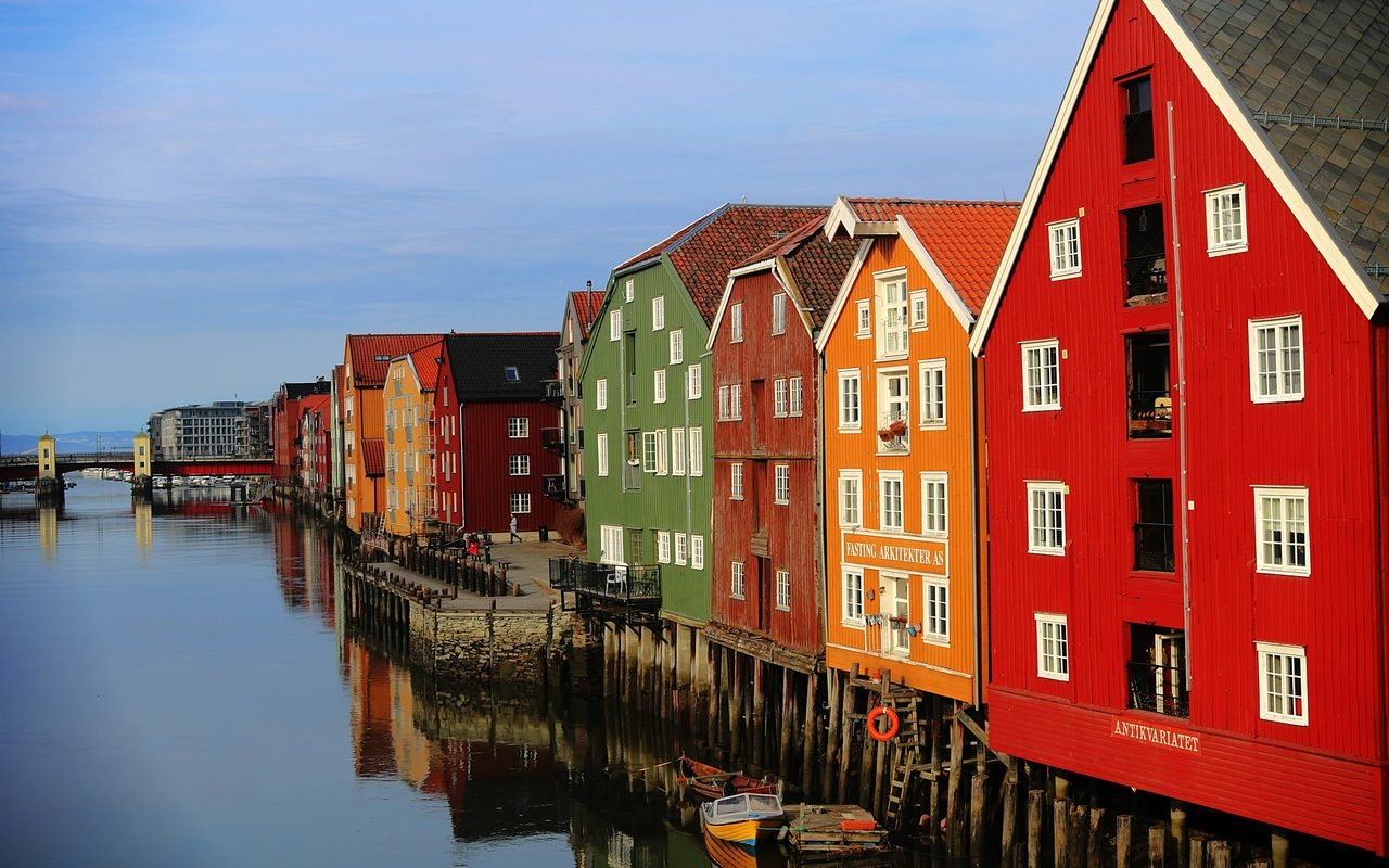 Painted wooden wharf houses on the Nidelva river in Trondheim