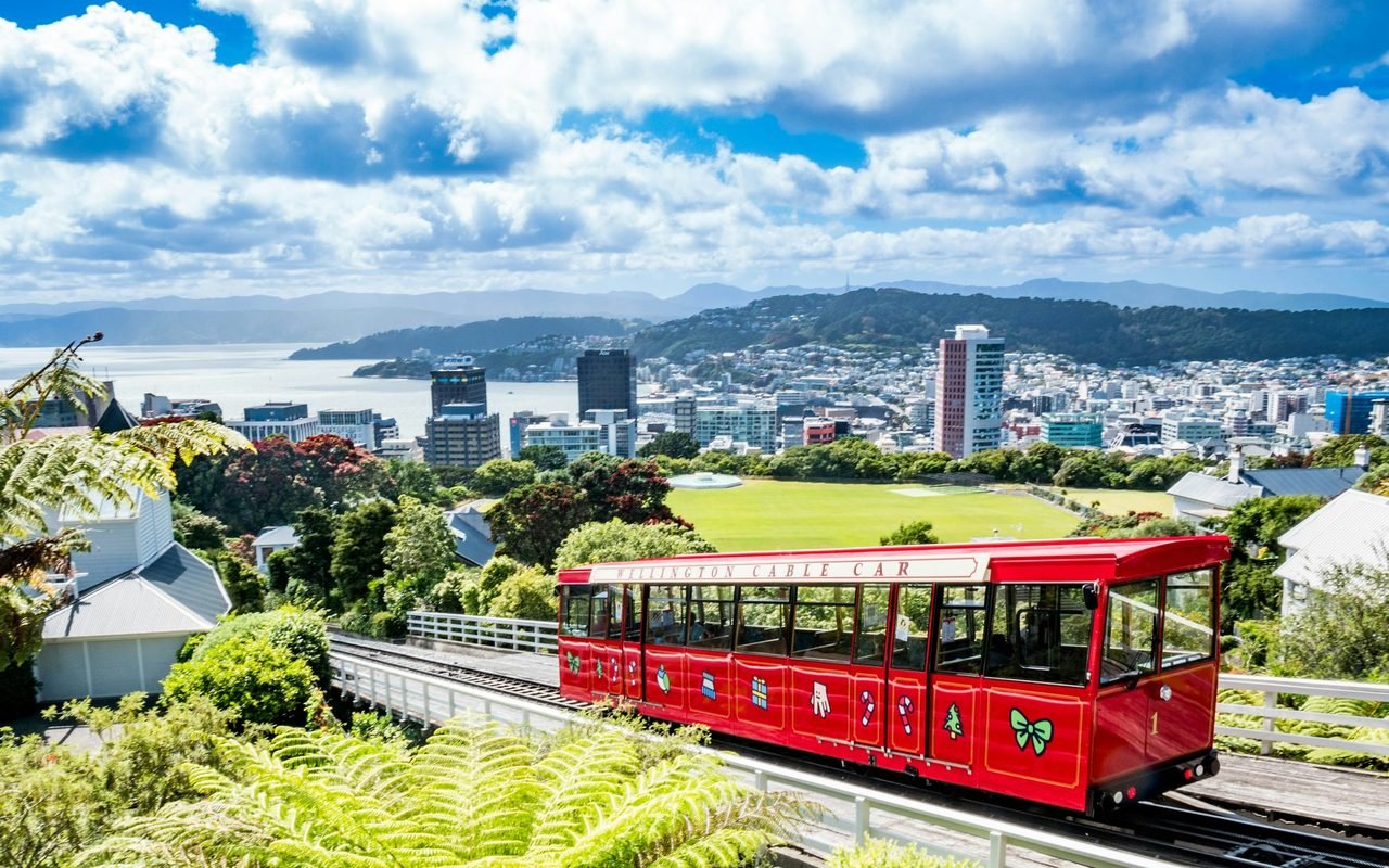 The red Wellington Cable Car above the city and harbour